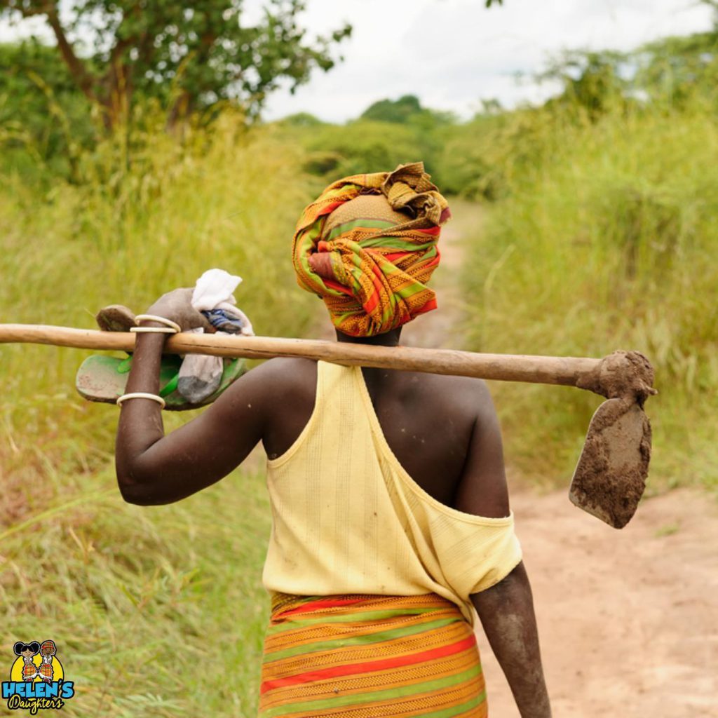 Helen's Daughters worker in the field